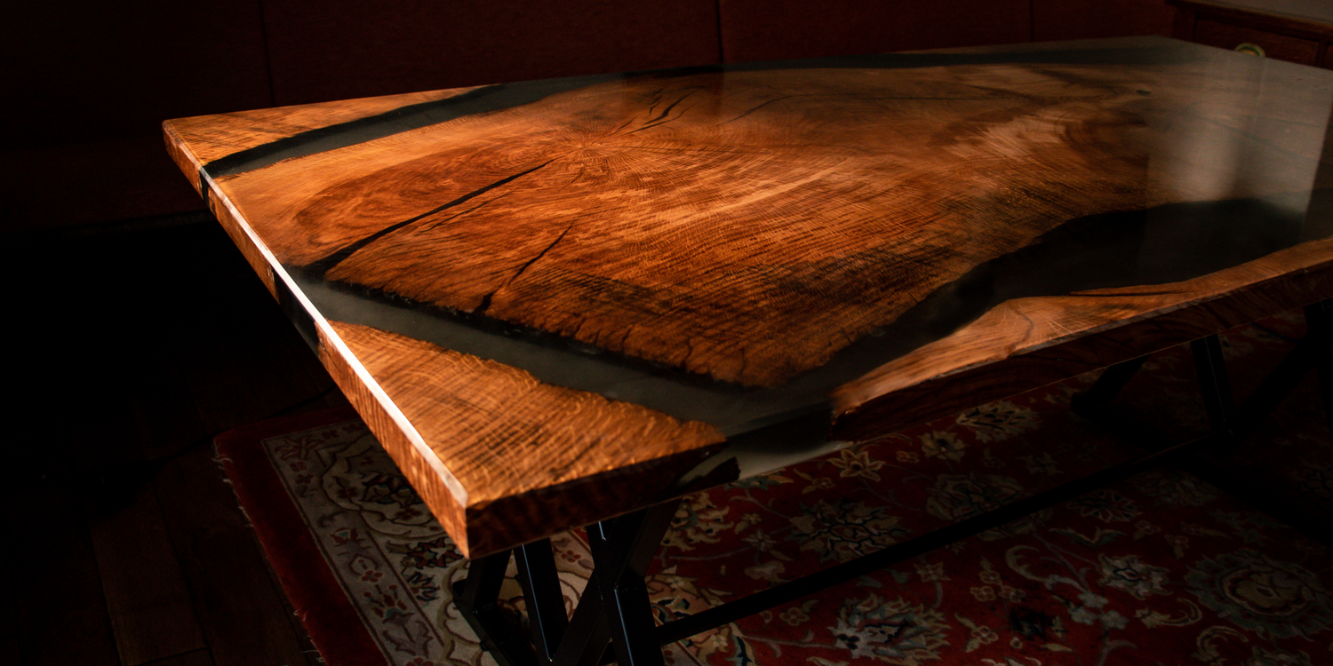 A picture of our first large project dubbed The Captains Table, using sustainably sourced eco friendly resin, and wind felled oak from the heart of Exmoor.